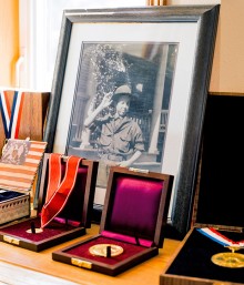 In his library, Gates keeps a photo of his father as a Boy Scout in Kansas City in 1918.  Photograph by José Mandojana. 