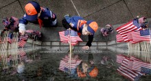 Cub Scouts from Pack 461 place American flags at Vietnam Veterans Memorial in Washington, D.C. // Photo courtesy of The Sacramento Bee